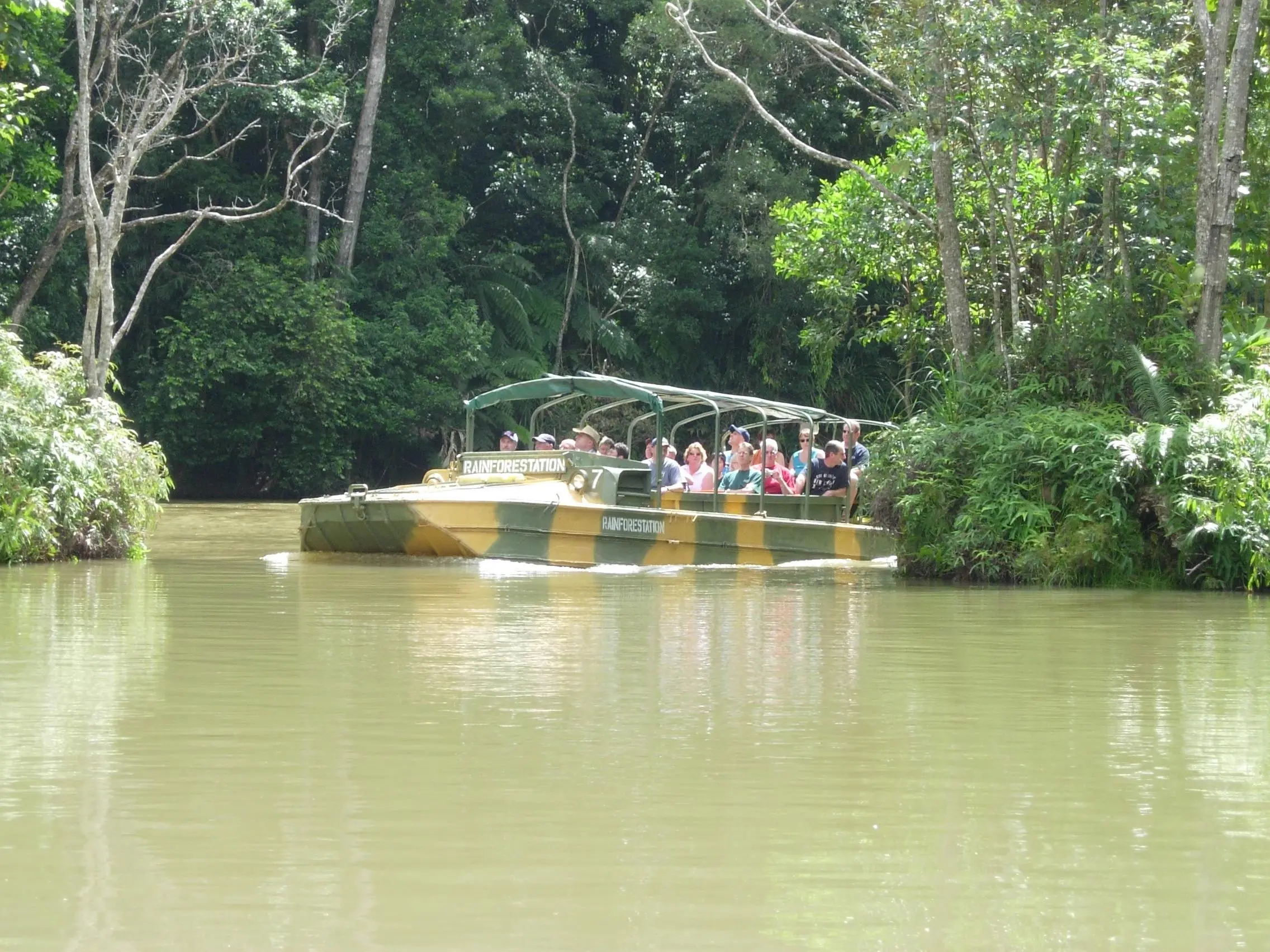 Rainforestation Army Duck on a river surrounded by trees