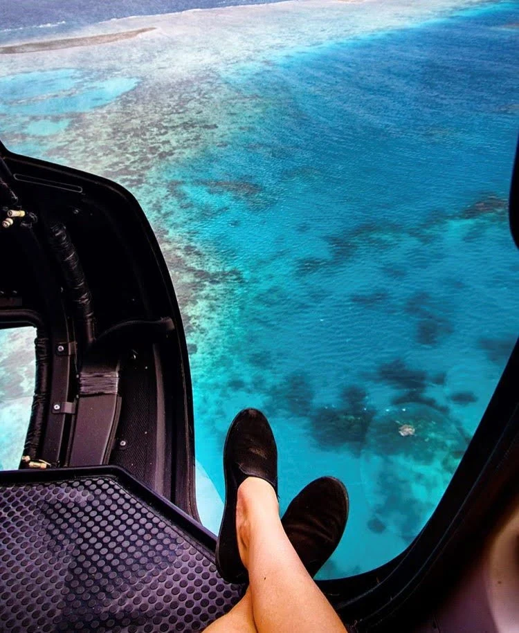 Looking down at the Great Barrier Reef from a helicopter