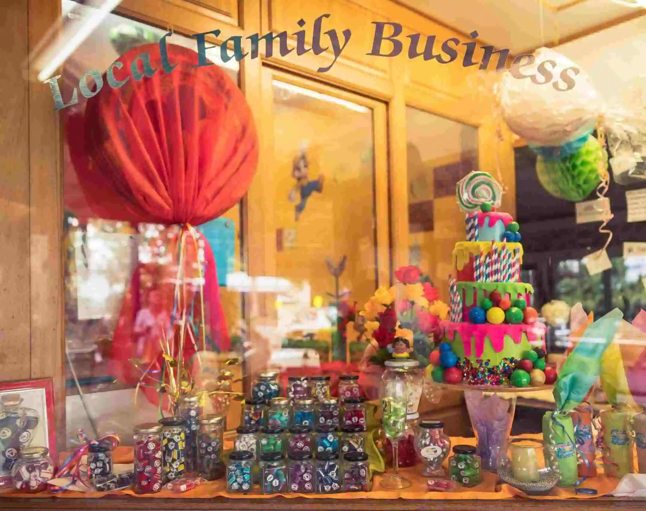 Kuranda Candy Kitchen shop window with colourful lolly jars